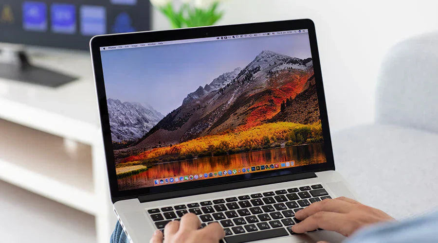 Customer bringing MacBook Pro to PayMore Kennesaw for evaluation